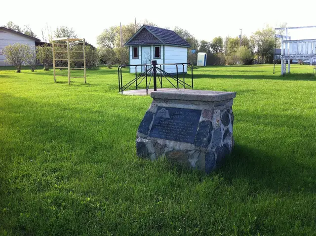 Rama School District marker and model schoolhouse